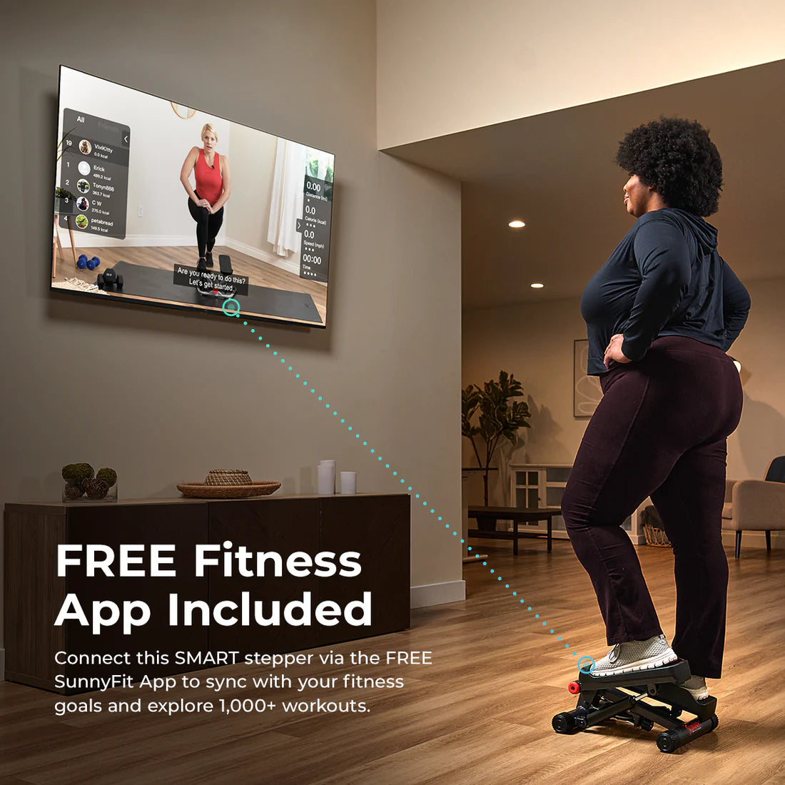 Woman using a smart stepper with a TV screen displaying a fitness app in a living room.