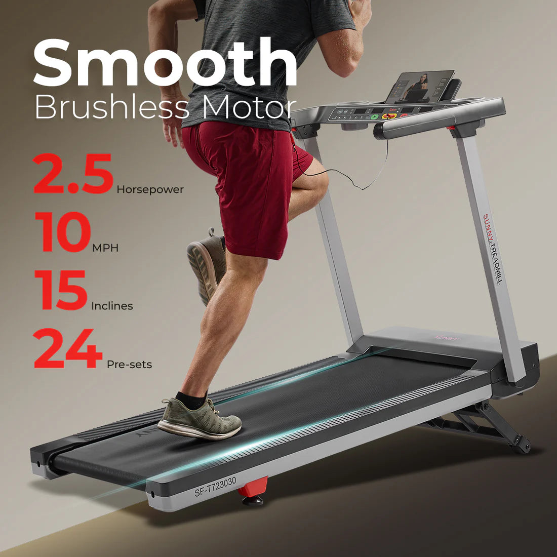 Person using a treadmill with specifications displayed on screen