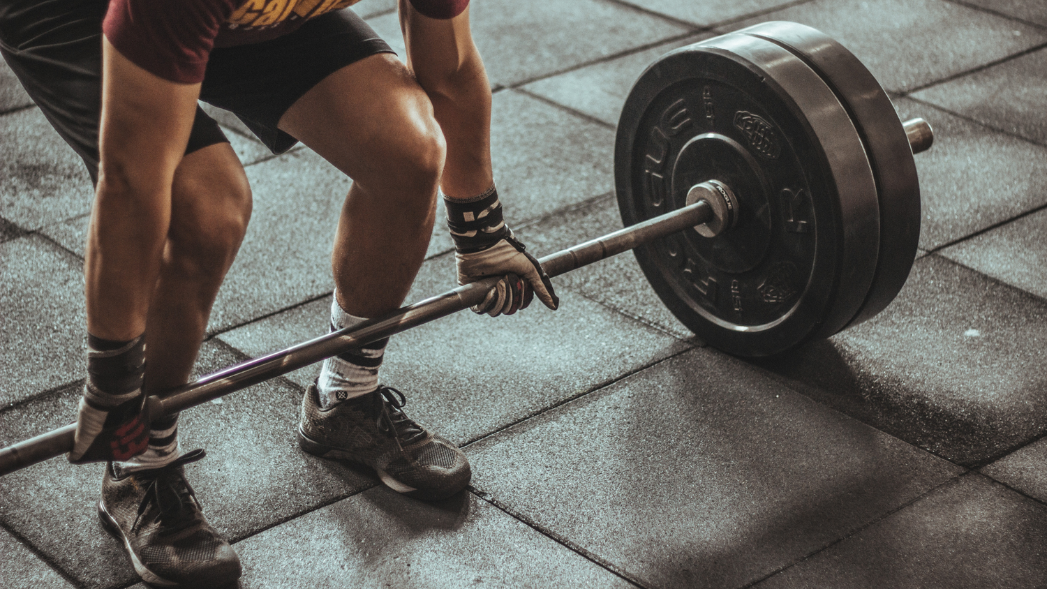 15 Ways to Work Out From Home with Barbells