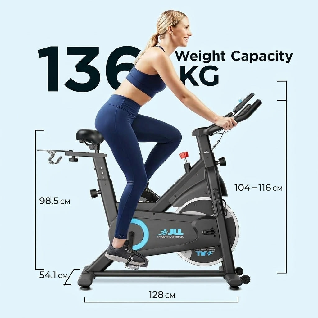 A woman riding a stationary exercise bike on a light blue background, with overlaid dimension labels showing 128 cm width, 98.5 cm seat height, 54.